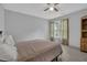 Serene bedroom with soft carpet, natural light, and a comfortable bed at 2530 River Run Dr, Dacula, GA 30019