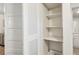 This closet has built in shelving and neutral paint at 850 Fourth St, Stone Mountain, GA 30083