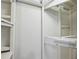 Walk-in closet with shelves and clothing hooks at 850 Fourth St, Stone Mountain, GA 30083