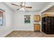 Dining room features tile floors, ceiling fan, and view to window at 850 Fourth St, Stone Mountain, GA 30083