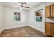 Dining room features tile floors, ceiling fan, and view to window at 850 Fourth St, Stone Mountain, GA 30083