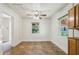 Dining room features tile floors, ceiling fan, and view to window at 850 Fourth St, Stone Mountain, GA 30083