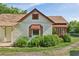 Exterior of a charming home with a screened-in porch and a lush front yard at 850 Fourth St, Stone Mountain, GA 30083