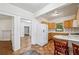 Traditional kitchen with tile floors, breakfast bar and wood cabinets at 850 Fourth St, Stone Mountain, GA 30083
