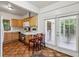 Spacious kitchen with stainless appliances, tile floors and view of backyard at 850 Fourth St, Stone Mountain, GA 30083