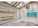 Sun room with wooden shelves, glass block windows and high ceilings at 850 Fourth St, Stone Mountain, GA 30083