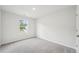 Bedroom with plush carpet, a window and fresh paint at 1452 Stephens View Dr, Loganville, GA 30052