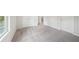 This bedroom offers fresh paint, carpet floors and lots of natural light at 1452 Stephens View Dr, Loganville, GA 30052