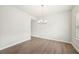 Bright dining room with modern chandelier and neutral color palette at 1452 Stephens View Dr, Loganville, GA 30052