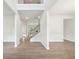 Spacious foyer showcasing staircase, with an open floor plan and modern finishes at 1452 Stephens View Dr, Loganville, GA 30052