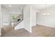 Inviting entryway showcasing staircase and an open floor plan with modern finishes at 1452 Stephens View Dr, Loganville, GA 30052