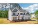 Charming two-story home featuring a classic design and well-maintained yard at 1452 Stephens View Dr, Loganville, GA 30052