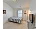 Bright bedroom features a twin bed and minimalist decor at 2132 Arnage Dr, Lithonia, GA 30058