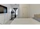 Bedroom with a full size bed, a workout machine, and a tv on the wall at 2132 Arnage Dr, Lithonia, GA 30058