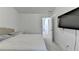 Bedroom with a view into a hallway with a tv on the wall and a full size bed at 2132 Arnage Dr, Lithonia, GA 30058
