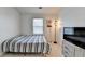 Bright bedroom features a twin bed and minimalist decor at 2132 Arnage Dr, Lithonia, GA 30058