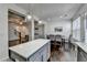 Open kitchen layout with a center island that opens to the dining and living area at 2132 Arnage Dr, Lithonia, GA 30058