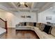 Inviting living room featuring a coffered ceiling, hardwood floors, and staircase at 2132 Arnage Dr, Lithonia, GA 30058