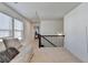 Bright loft with comfortable seating and a staircase at 2132 Arnage Dr, Lithonia, GA 30058