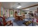 Inviting living room featuring a cozy dining area and comfortable seating at 6605 Old White Mill Rd, Fairburn, GA 30213