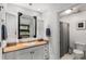 Bathroom featuring single vanity and combination shower and tub at 1341 Sheffield Glen Ne Way, Atlanta, GA 30329