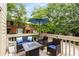 Outdoor deck space with comfortable seating and dining furniture; perfect for entertaining at 1341 Sheffield Glen Ne Way, Atlanta, GA 30329