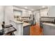 Modern kitchen features granite countertops, stainless steel appliances, and a breakfast bar area at 1341 Sheffield Glen Ne Way, Atlanta, GA 30329