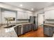 Modern kitchen with stainless steel appliances, granite countertops, and plenty of cabinet space at 1341 Sheffield Glen Ne Way, Atlanta, GA 30329