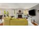 Inviting living room with fireplace and view to the outdoor patio at 1341 Sheffield Glen Ne Way, Atlanta, GA 30329