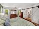 Stylish primary bedroom features an ensuite bathroom and large windows at 1341 Sheffield Glen Ne Way, Atlanta, GA 30329