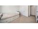 Bright bedroom with a window and a daybed that features three drawers at 3075 Westpoint Cir, Snellville, GA 30078