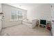 Bright bedroom with a window and a daybed that features three drawers, plus a small bookcase at 3075 Westpoint Cir, Snellville, GA 30078