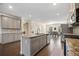 Modern kitchen featuring granite countertops, stainless steel appliances, and a center island at 3075 Westpoint Cir, Snellville, GA 30078