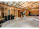 Unfinished basement area ready for customization with exposed framing and concrete flooring at 33 New Kent Ct, Villa Rica, GA 30180