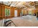 Unfinished basement, framed and ready to customize with windows and natural light at 33 New Kent Ct, Villa Rica, GA 30180
