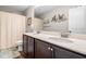 Bathroom featuring a double vanity, soft lighting, and nautical decor at 33 New Kent Ct, Villa Rica, GA 30180