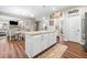 Kitchen island featuring granite countertops and additional storage space at 33 New Kent Ct, Villa Rica, GA 30180