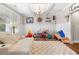 Cozy living room featuring a white sofa, coffered ceilings, and abundant natural light at 33 New Kent Ct, Villa Rica, GA 30180