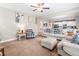 Comfortable living room with neutral-toned furnishings and an open layout to the kitchen at 33 New Kent Ct, Villa Rica, GA 30180