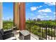 Beautiful balcony featuring a cozy seating area with views of the lush, green cityscape at 3820 Roswell Ne Rd # 1001, Atlanta, GA 30342