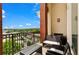 Relaxing balcony view with stylish seating and wrought iron railing overlooking city at 3820 Roswell Ne Rd # 1001, Atlanta, GA 30342