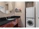 Bathroom featuring modern washer and dryer at 3820 Roswell Ne Rd # 1001, Atlanta, GA 30342