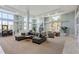 Inviting common room with comfortable seating and large windows offering natural light at 3820 Roswell Ne Rd # 1001, Atlanta, GA 30342