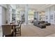 Bright common room with a variety of seating options and abundant natural light at 3820 Roswell Ne Rd # 1001, Atlanta, GA 30342