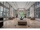 Grand lobby featuring soaring ceilings, elegant decor, and natural light at 3820 Roswell Ne Rd # 1001, Atlanta, GA 30342