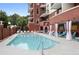 Sparkling swimming pool with comfortable lounge chairs for relaxing poolside at 3820 Roswell Ne Rd # 1001, Atlanta, GA 30342