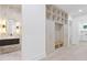 Modern bathroom and mudroom with integrated storage solutions and stylish finishes at 1349 Oak Road, Lilburn, GA 30047
