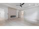 Spacious bedroom with hardwood floors, modern fireplace, and ensuite bathroom at 1349 Oak Road, Lilburn, GA 30047