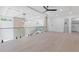 Bright hallway featuring hardwood flooring and modern lighting at 1349 Oak Road, Lilburn, GA 30047
