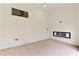 This room has painted brick walls, a neutral-tone floor, and a modern window design at 1349 Oak Road, Lilburn, GA 30047